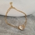 Pulseira coração crucifixo cravejado na internet