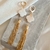 Brinco trevo tassel