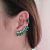 Earcuff esmeralda com piercing