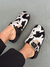 MULES DORILA BIRK NEGRA PELO PRINT COW - comprar online