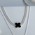 Chocker manta prata trevo preto na internet