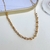 Chocker elos inpiração Ct dourado na internet