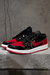 Air Jordan (negra y rojo) en internet
