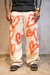 Pantalon custom corazones (crudo) en internet