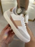 Tênis Casual Branco Detalhe Cinza e Nude