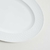 Plato oval porcelana blanca diseño encadenado 30.5x22.5 cm en internet