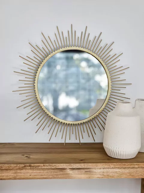 Espejo de hierro dorado