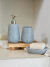 Dispenser ceramica simil mármol redondo 19cm gris en internet