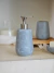 Dispenser ceramica simil mármol redondo 19cm gris - comprar online