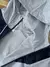 Jaqueta Nike Windrunner (cinza/azul) na internet