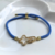 Pulseira Regulável Mosquetão Cruz Ouro - loja online
