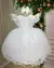 Vestido Baby Branco Busto Pérolas Manga Renda Babados - comprar online