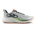 Zapatilla Olympikus Circuito Performance para hombre color blanco con detalles en negro, verde y suela naranja, diseñada para running y gimnasio