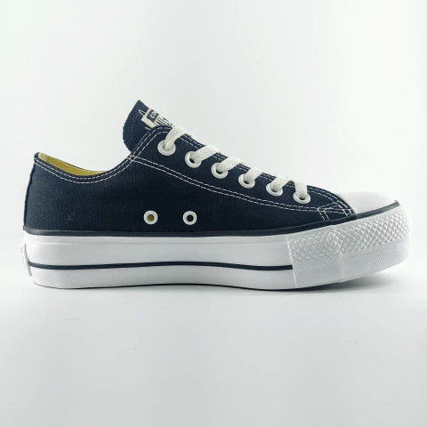 Zapatilla Converse CT All Star Lift Ox negra de perfil con suela blanca gruesa