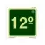 Placa de sinalização fotoluminescente indicando o 12º andar, com fundo verde e números em destaque.
