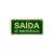 Placa de sinalização fotoluminescente com a inscrição "SAÍDA DE EMERGÊNCIA" em verde e branco, medidas 15x30 cm, feita de PVC.