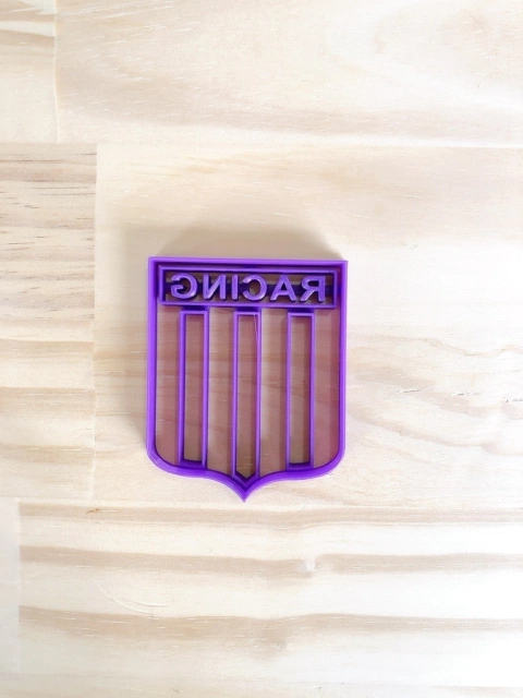 Deportes 11 - Racing Escudo