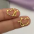 Piercing Torção Coração Diabinho Dourado na internet