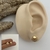 Brinco Concha - Carola Art Piercing | Atacado e Varejo
