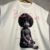 REGATA MACHÃO BABY BLACK POWER na internet