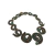 Colar Bahamas com design em espiral, adornado com contas turquesa e detalhes em bronze.