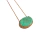 Colar Emerald Glow com pedra esmeralda envolta por zircônias cravejadas e detalhes em banho de ouro amarelo, delicado e sofisticado.

