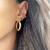 Argola Tubo Rita M - Banhada a Ouro - comprar online