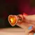 Plug anal P rose gold com pedra laranja na internet