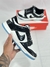 Dunk low preto branco sola azul