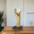 Imagem do Escultura Mão Resina Dourada com Bola em Vidro Decorativa