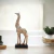 Escultura Girafa em Resina com cabeça Prateada G na internet