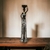 Escultura Africana em Resina Carregando Prato na Cabeça - comprar online