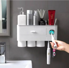 Dispenser Pasta Dental Porta Cepillos Organizador De Baño en internet