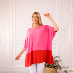 Remerón Jackie de manga corta en colores rosa y rojo, luciendo un diseño moderno y cómodo.