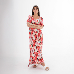 Vestido largo de flores en tonos rojos y crema, modelo Luna, con mangas cortas y detalle de abertura lateral.