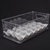 Organizador de ovos transparente com capacidade para 15 ovos, ideal para manter a geladeira organizada.