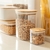Pote hermético com tampa de bambu, 2 litros. Na medida certa para armazenar e organizar alimentos como grãos, farinhas e massas, mantendo a frescura e a crocância. Design elegante que valoriza qualquer cozinha.