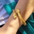 Bracelete serpente dourado - comprar online
