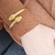 Bracelete serpente dourado na internet