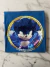 Buzo frizado Sonic mano - tienda online