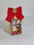 Caixa de festa Bela e a Fera com laço vermelho e personagens impressos, ideal para festas de meninas.