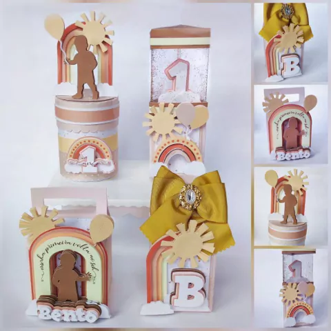 Decoração de festa de aniversário de um ano para menino, com elementos coloridos como sol, arco-íris e balões.