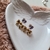 Brincos Heart Ribbon Gold - Del Moon