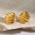 Brinco croissant oval dourado - comprar online