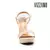 Imagen de SANDALIA ALTA BEIGE CON CHAROL (629220013488)