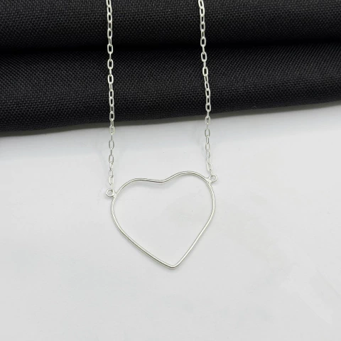 Colar coração vazado cartie em prata 925