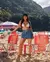 Mini Saia Jeans Feminina Cintura Alta com Cinto na internet