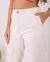 CALÇA SARJA FEMININA WIDE LEG CÓS REVEL E BARRA DESFIADA OFF WHITE - loja online