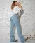 Calça Jeans Flare Feminina Cintura Média Bordado Desfiado Ana Castela na internet