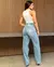 Calça Jeans Reta Feminina Cintura Alta Detalhe Bolso Ana Castela na internet